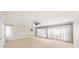 Large bedroom featuring a ceiling fan, neutral paint and window coverings at 1903 Olde Village Run, Dunwoody, GA 30338