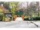 Community with amenities like a tennis and pickleball shop accessible via a charming wooden footbridge at 1903 Olde Village Run, Dunwoody, GA 30338