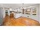 Bright eat-in kitchen with hardwood floors, granite countertops and modern appliances at 1903 Olde Village Run, Dunwoody, GA 30338