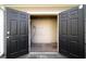 Convenient, secure outdoor storage space with double doors for easy access to tools and equipment at 1903 Olde Village Run, Dunwoody, GA 30338