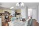 Charming kitchen with stainless steel appliances, a breakfast nook, and hardwood floors at 4265 Elmhurst Ln, Cumming, GA 30028