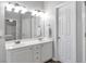 Bright bathroom featuring double sinks, great lighting, and a clean color scheme at 4265 Elmhurst Ln, Cumming, GA 30028