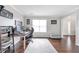 Comfortable home office space with natural light, wooden floors, and a calming atmosphere at 4265 Elmhurst Ln, Cumming, GA 30028