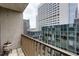 Balcony view showcasing city skyscrapers and lush greenery at 145 15Th Ne St # 1012, Atlanta, GA 30309