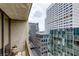 Balcony view showcasing city skyscrapers and lush greenery at 145 15Th Ne St # 1012, Atlanta, GA 30309