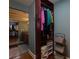 Walk-in closet with custom shelving adjoins Primary bath for luxurious dressing and storage solution at 145 15Th Ne St # 1012, Atlanta, GA 30309