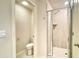Bathroom featuring a tiled shower and white flooring at 353 Vista Ln, Woodstock, GA 30189