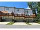 Charming townhome features private decks, ground garages, and manicured green spaces at 353 Vista Ln, Woodstock, GA 30189