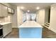 Open-concept kitchen with large center island perfect for entertaining and meal preparation at 353 Vista Ln, Woodstock, GA 30189