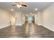 Open floor plan connecting the living room to the kitchen and dining area at 353 Vista Ln, Woodstock, GA 30189