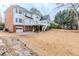 Spacious backyard of a two-story home featuring a white deck at 2541 Berwick Walk, Snellville, GA 30078