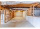 Unfinished basement showing exposed ducts and wooden beam framing at 2541 Berwick Walk, Snellville, GA 30078