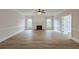Spacious living room with hardwood floors and a fireplace, perfect for entertaining at 2541 Berwick Walk, Snellville, GA 30078