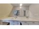 Bathroom with a double sink vanity and framed mirrors at 250 Southmoor Cir, Stockbridge, GA 30281