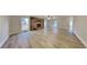 Spacious living room boasts a stone fireplace and modern flooring, perfect for gatherings and relaxation at 250 Southmoor Cir, Stockbridge, GA 30281