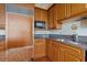 View of the cabinets, countertops, and built-in refrigerator in the kitchen at 750 Park Ne Ave # 21E, Atlanta, GA 30326