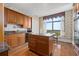 Well-lit kitchen with a center island and an exterior view at 750 Park Ne Ave # 21E, Atlanta, GA 30326