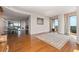 Open living space featuring hardwood floors and access to a dining room at 750 Park Ne Ave # 21E, Atlanta, GA 30326