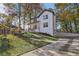 Well-manicured lawn with a charming two-story home and inviting porch at 2190 Lakeway Dr, Dacula, GA 30019