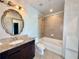 Bathroom features a soaking tub, granite vanity, and modern fixtures at 400 W Peachtree Nw St # 2808, Atlanta, GA 30308