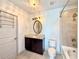 Well-lit bathroom with shower and bathtub combination at 400 W Peachtree Nw St # 2808, Atlanta, GA 30308