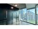 Modern bedroom features city views, a large closet and a modern design at 400 W Peachtree Nw St # 2808, Atlanta, GA 30308