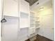 Well-organized walk-in closet with ample shelving and storage space at 400 W Peachtree Nw St # 2808, Atlanta, GA 30308
