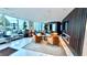 Modern lounge area with comfortable seating, city views, and a sleek bar at 400 W Peachtree Nw St # 2808, Atlanta, GA 30308