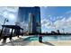 Rooftop community pool in a luxury building, with sun deck and plenty of seating at 400 W Peachtree Nw St # 2808, Atlanta, GA 30308