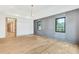 Spacious bedroom features recessed lighting, hardwood flooring and modern-style lighting fixture at 401 Lynne Cir, Alpharetta, GA 30009