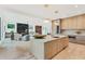Bright, open-concept kitchen with a large island, marble countertops, and stainless steel appliances at 401 Lynne Cir, Alpharetta, GA 30009