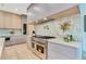 Close-up of a gourmet kitchen with granite countertops and stainless steel appliances at 401 Lynne Cir, Alpharetta, GA 30009