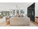 Spacious living room with modern fireplace, recessed lights, and backyard access at 401 Lynne Cir, Alpharetta, GA 30009