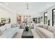 Open-concept living area with recessed lighting, hardwood floors, and upscale furnishings at 401 Lynne Cir, Alpharetta, GA 30009