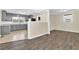 Updated kitchen boasts gray cabinets, stainless appliances, and neutral countertops at 1729 James Burgess Rd, Suwanee, GA 30024