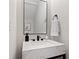 Stylish powder room boasting sleek fixtures and a marble vanity, enhancing a modern aesthetic at 1966 Drew Nw Dr, Atlanta, GA 30318