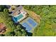 Birds eye view featuring community amenities: pool, tennis courts, baseball field, and playground at 7215 Gresham Trce, Cumming, GA 30040
