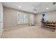Bedroom with carpet and a window offering natural light and a workstation at 7215 Gresham Trce, Cumming, GA 30040