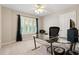Bright home office space with a desk, chair and natural light from a window at 7215 Gresham Trce, Cumming, GA 30040