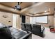 Home theater with comfortable seating, projector, and screen, perfect for movie nights at 7215 Gresham Trce, Cumming, GA 30040
