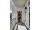 Balcony showcasing open doorway to interior space, complemented by outdoor wall lighting and views of the city at 2500 Peachtree Nw Rd # 606N, Atlanta, GA 30305