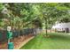 Pet-friendly dog park equipped with waste stations and seating for residents at 2500 Peachtree Nw Rd # 606N, Atlanta, GA 30305