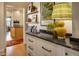 Transitional kitchen with granite counters, modern cabinets, and stainless appliances at 2500 Peachtree Nw Rd # 606N, Atlanta, GA 30305