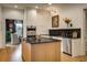 Bright kitchen with stainless appliances, a functional center island, and classic white cabinetry at 2500 Peachtree Nw Rd # 606N, Atlanta, GA 30305