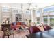 Sun-filled living room with neutral colors, a comfortable seating arrangement and outdoor views at 2500 Peachtree Nw Rd # 606N, Atlanta, GA 30305