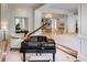 Elegant lobby featuring a grand piano, high ceilings, and beautiful marble flooring at 2500 Peachtree Nw Rd # 606N, Atlanta, GA 30305