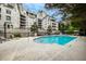 Inviting swimming pool surrounded by lush landscaping and upscale residential buildings at 2500 Peachtree Nw Rd # 606N, Atlanta, GA 30305