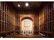 Custom wine cellar with wood racking system to store wine at the proper temperature for aging at 2500 Peachtree Nw Rd # 606N, Atlanta, GA 30305