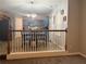 Modern kitchen and breakfast nook area with sleek appliances and a dining table at 204 Hightower Trl, Riverdale, GA 30274