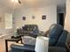 Cozy living room with comfortable seating and neutral decor, great for Gathering gatherings at 204 Hightower Trl, Riverdale, GA 30274